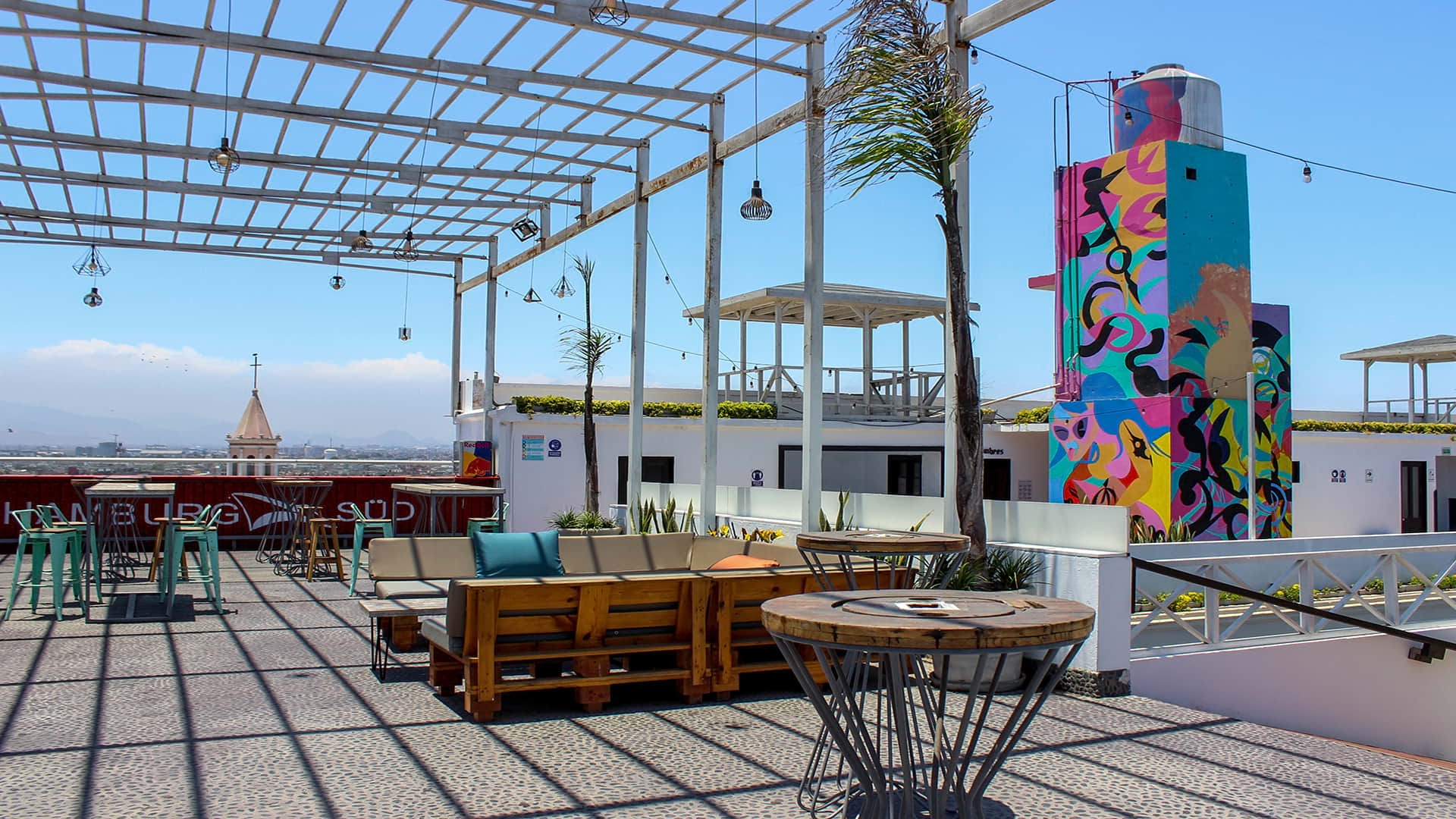 An outdoor patio with brightly painted urban art beside it in Lima, seen during a tour with Responsible Travel Peru