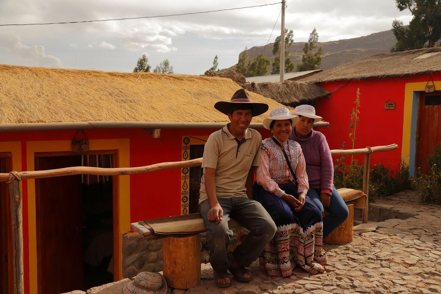 11Sebastian and Jesusa with their daughter welcome visitors in their family home in Coporaque, Colca Canyon, Peru. Community-Based Tourism with RESPONSible Travel Peru.