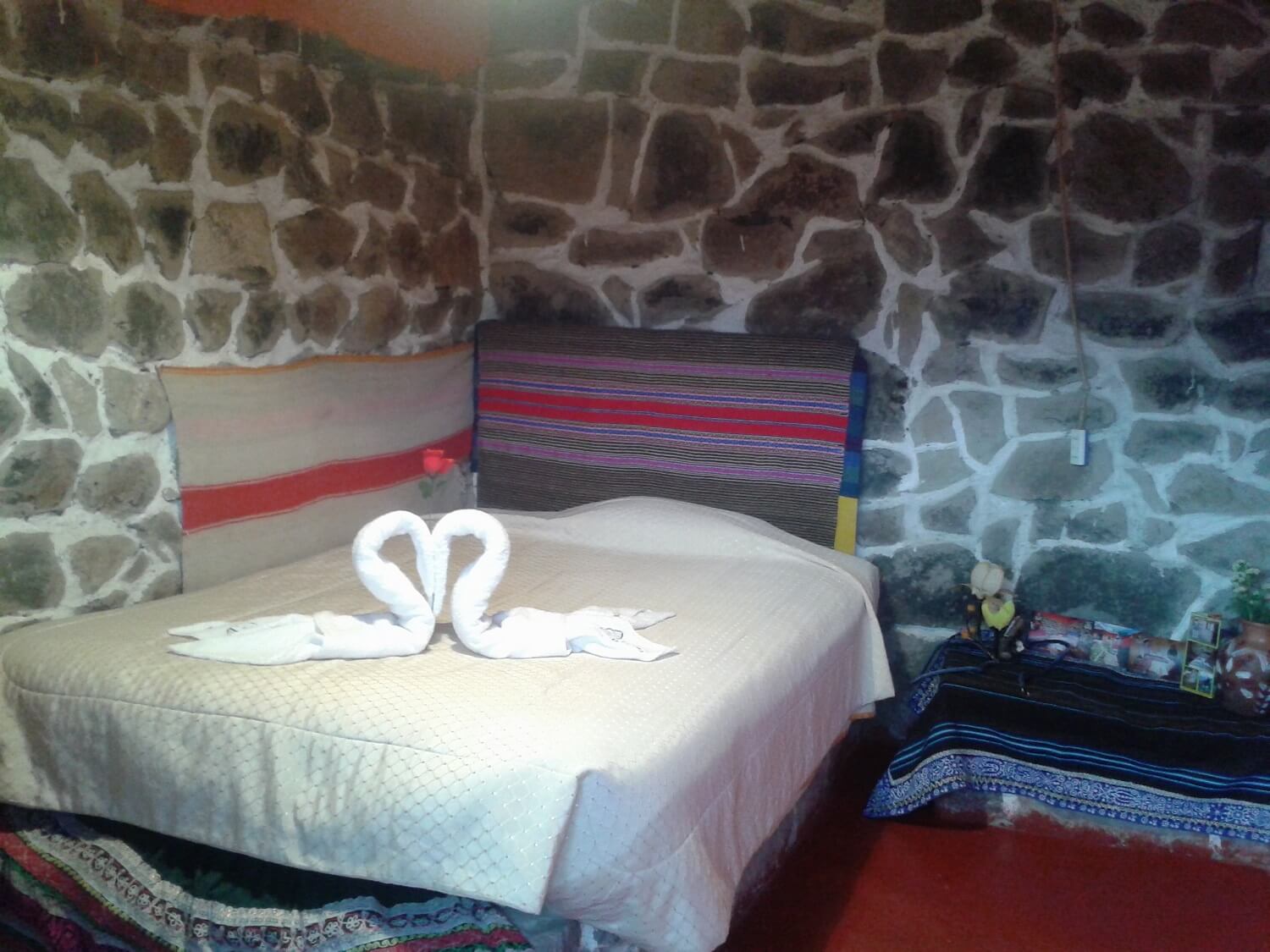 11Decorated bed in homestay in Coporaque, Colca Canyon. Community-Based Tourism in Peru with RESPONSible Travel Peru.