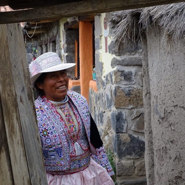 Local host in Coporaque welcomes visitors to her house with homestay. Colca Canyon - RESPONSible Travel Peru