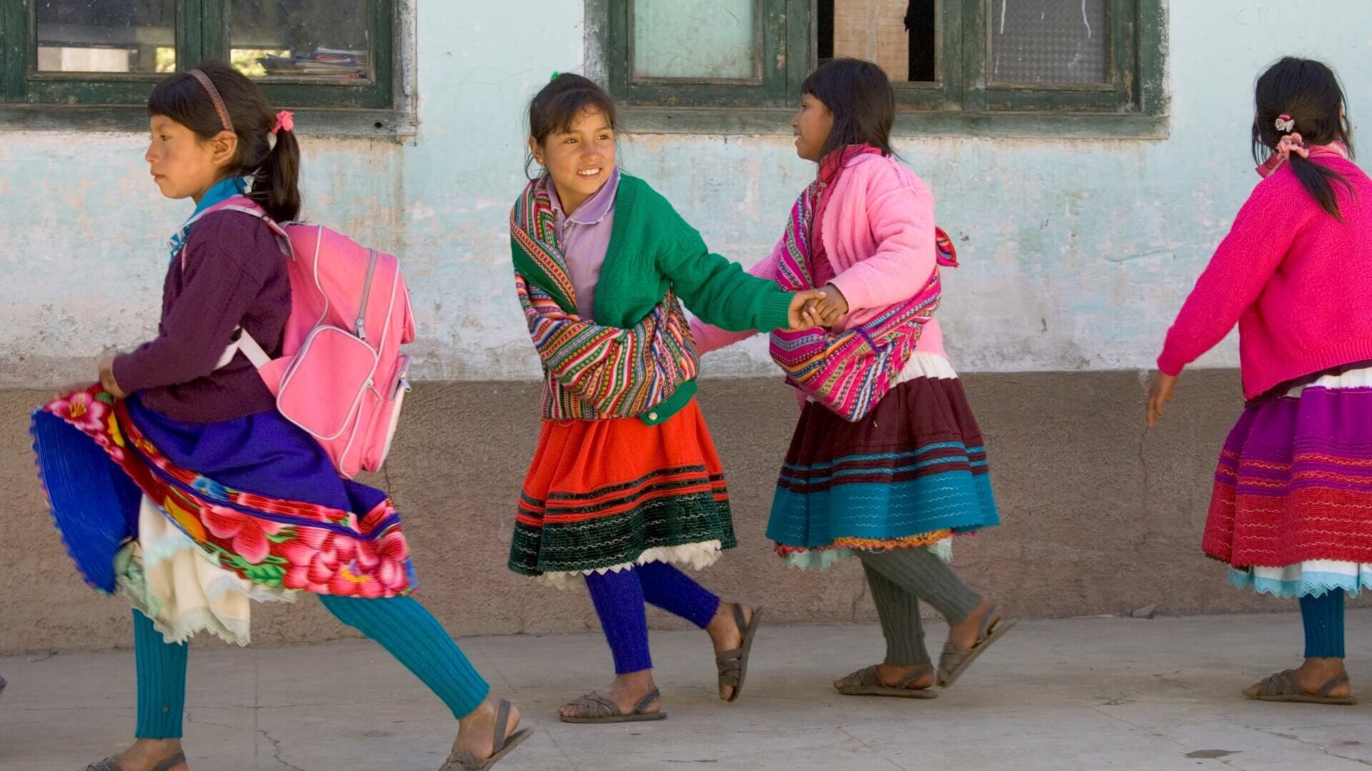School girls in traditional dresses in Vicos, Peru. The best community-based tourism of Peru | RESPONSible Travel Peru