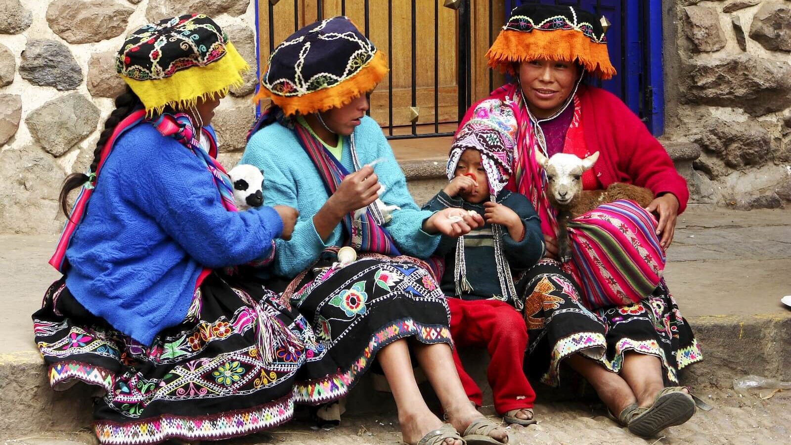 Local ladies in traditional dresses on the streets of Cusco, Peru. | RESPONSible Travel Peru