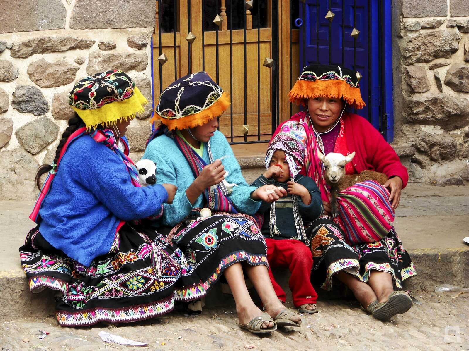 11Local ladies in traditional dresses on the streets of Cusco, Peru. | RESPONSible Travel Peru