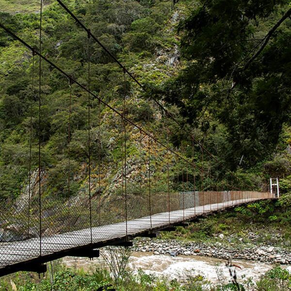 Rope bridge over the Vilcanota River on the Coffee Route to Machu Picchu - RESPONSible Travel Peru