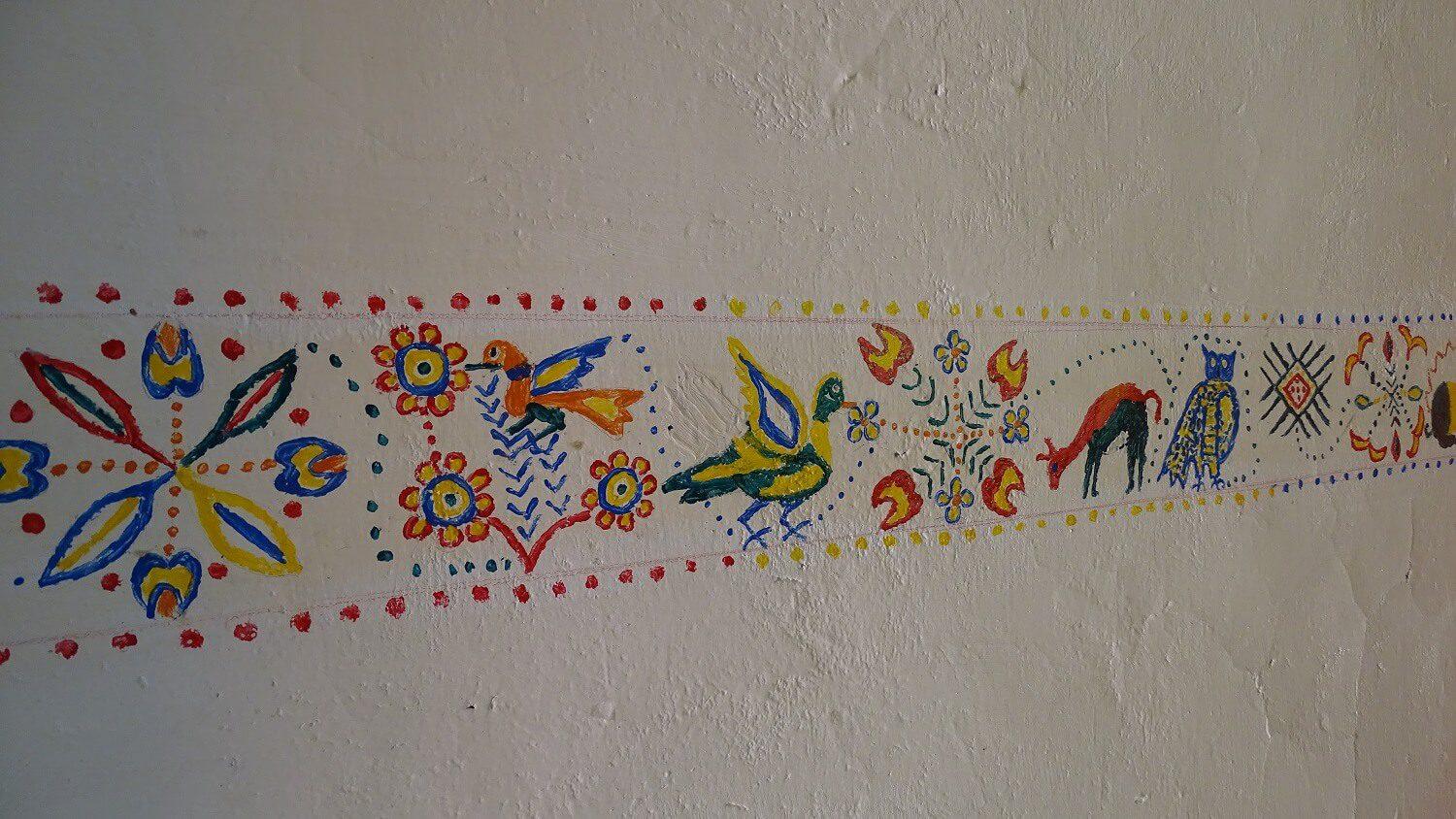 11Decorations on the wall of a homestay in Sibayo. | RESPONSible Travel Peru