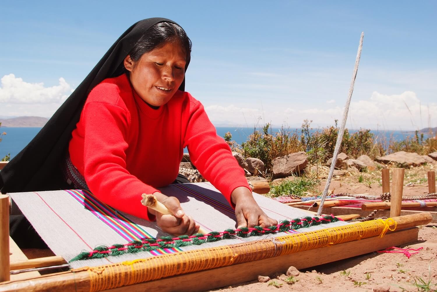 11Weaving lady on Taquile island, Lake Titicaca, Peru. Community Based tourism in Peru with RESPONSible Travel Peru