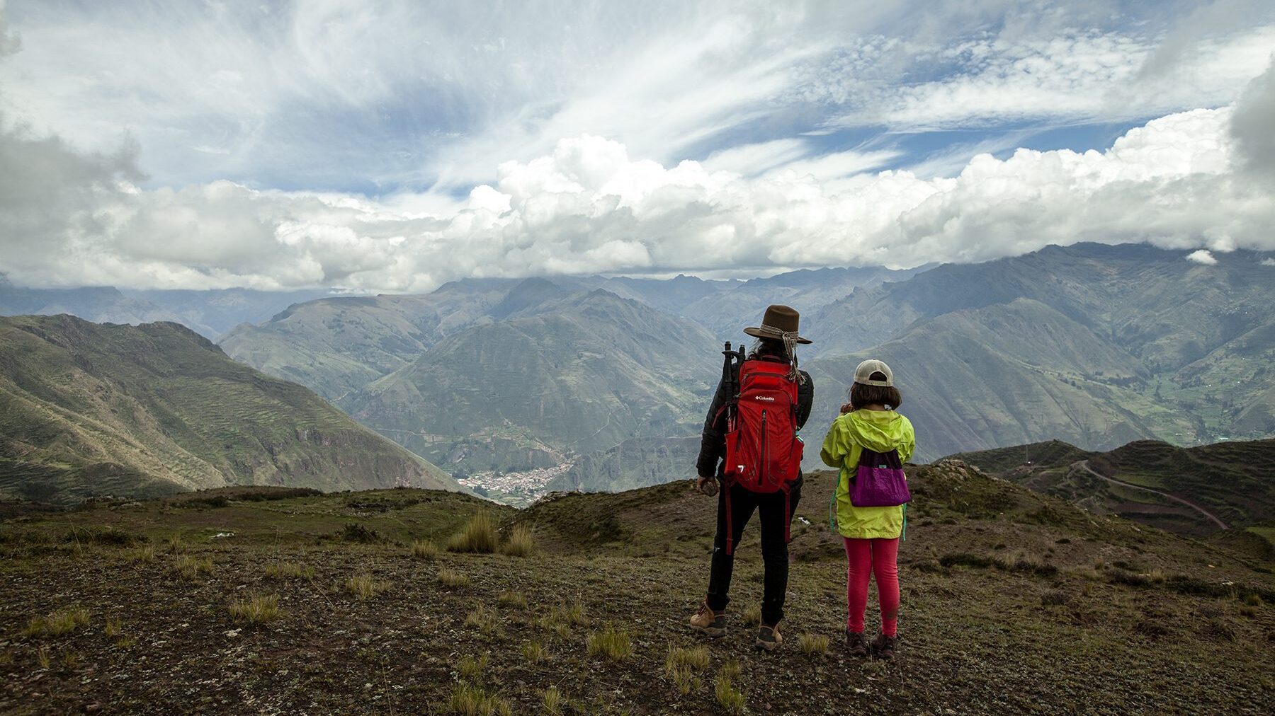 Mom and daughter enjoying the view of the Sacred Valley | Responsible Travel Peru