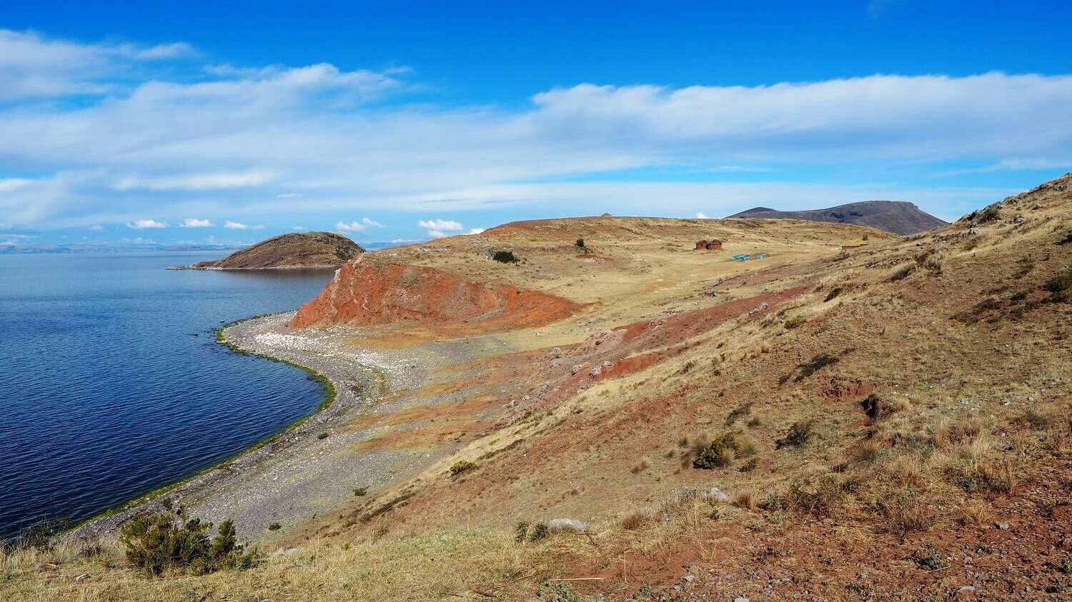 The shores of Lake Titicaca as seen from the uninhabited island of Tikonata | RESPONSible Travel Peru