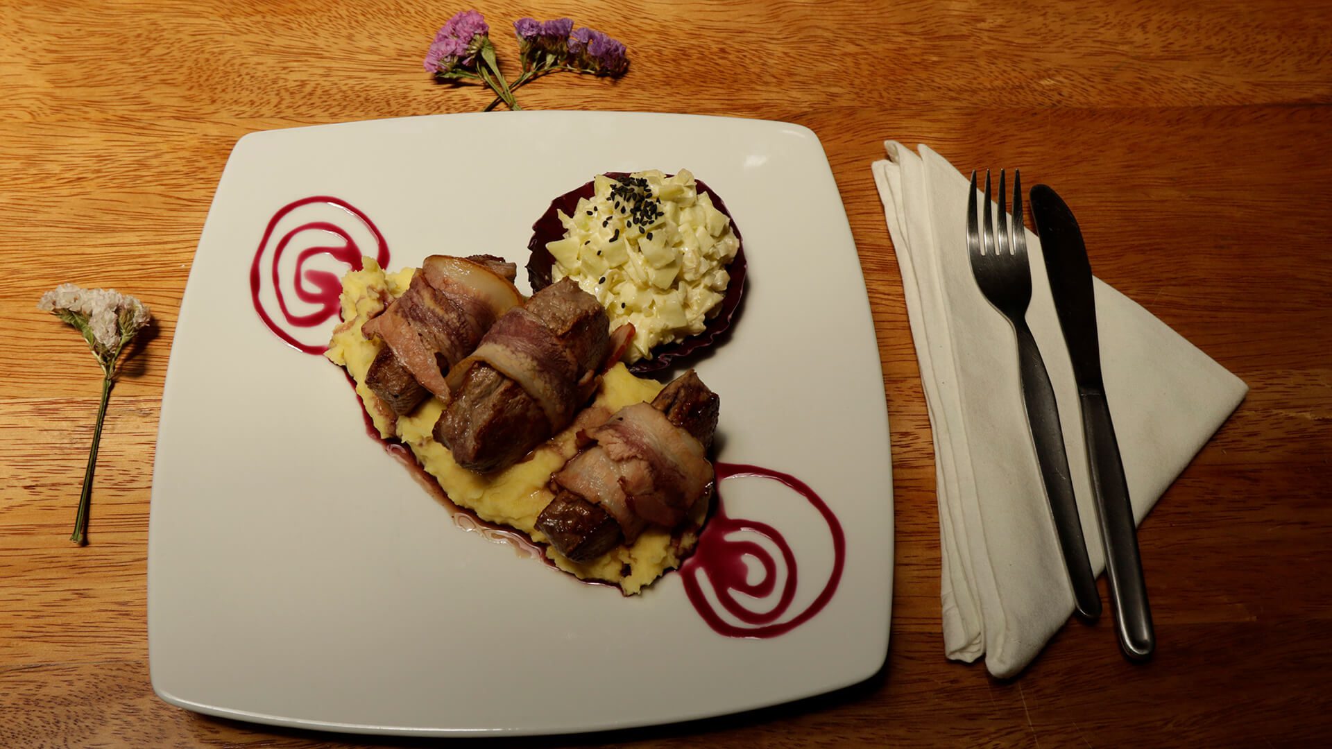 Alpaca meat and bacon with complementary mash potato and salad | RESPONSible Travel Peru