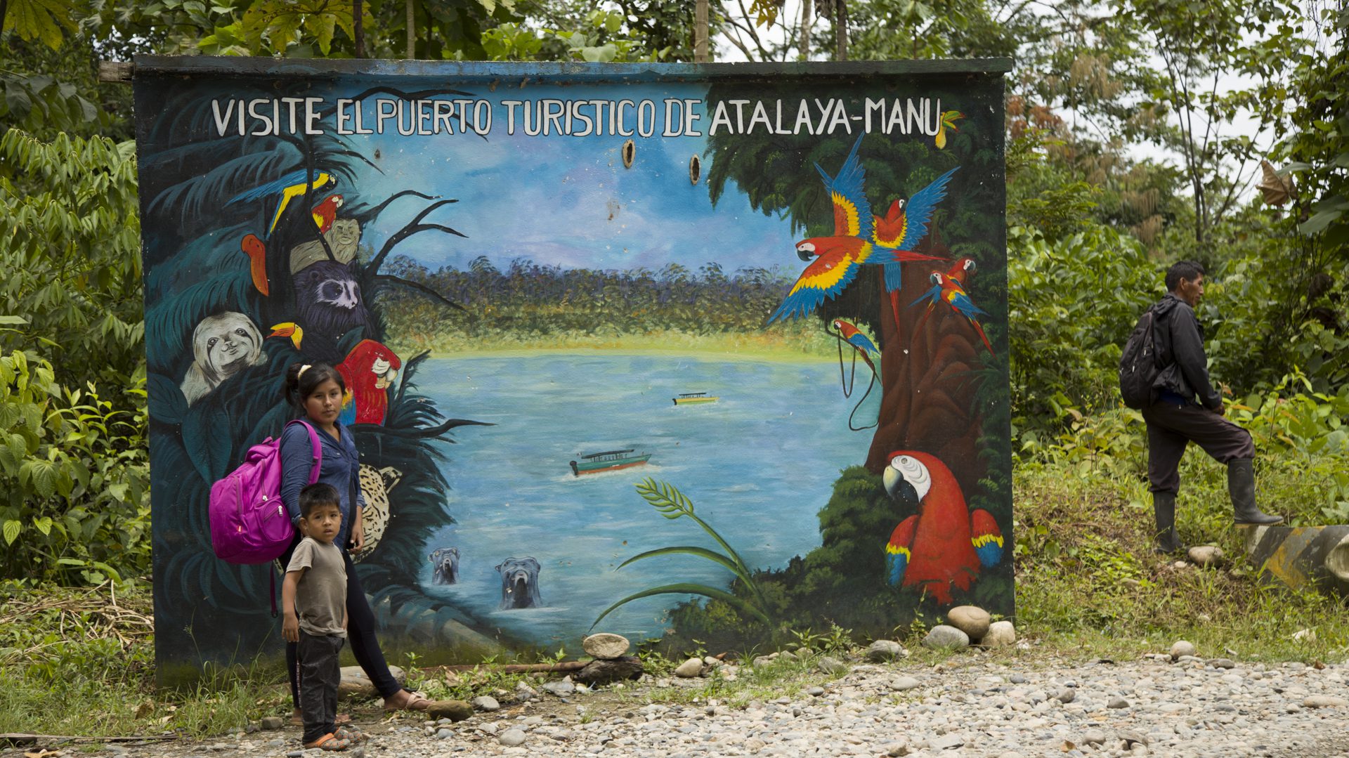 Mural depicting Manu's natural richness at a point where locals wait for ground transportation | Responsible Travel Peru
