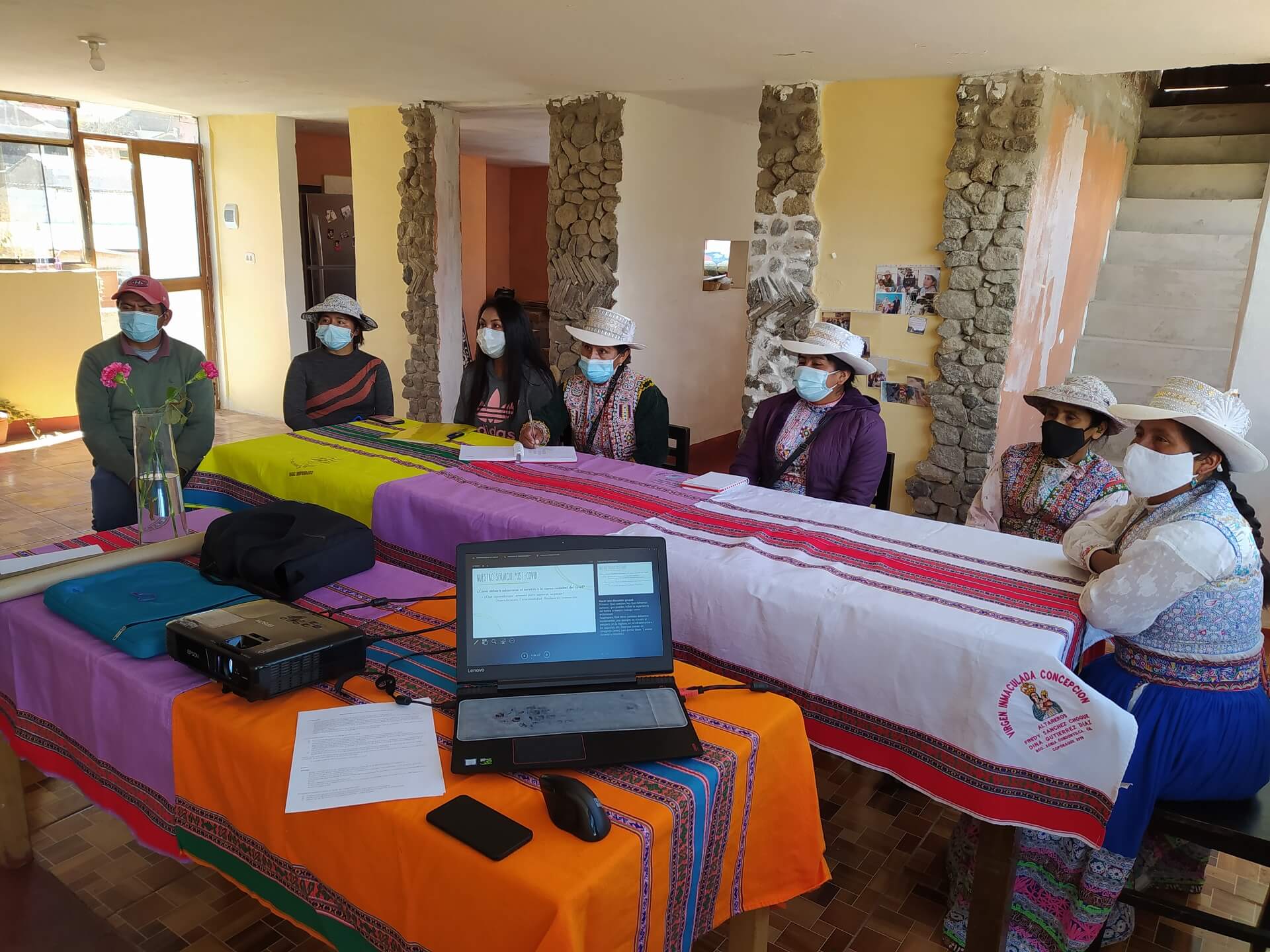 Local women participating in a workshop during Covid times, learning about sustainability, Covid measurements and other themes, organized by RESPONSible Travel Peru.