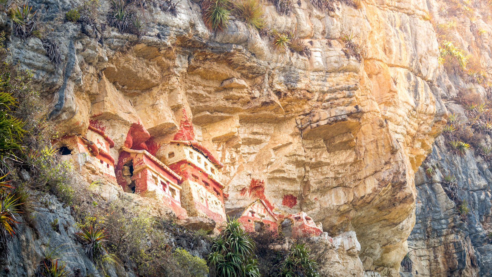 The red-and-ochre Chachapoya funerary precincts in cliffs