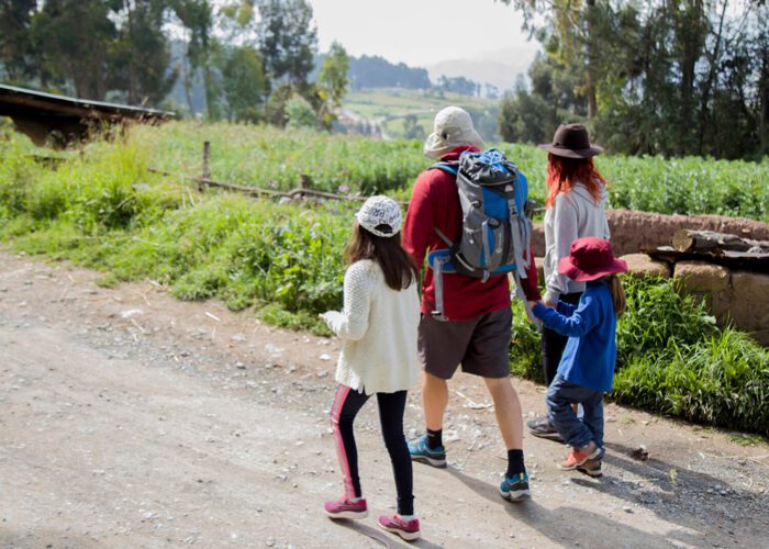 11A family with to young girls walking in the countryside out of Cusco city | RESPONSible Travel Peru