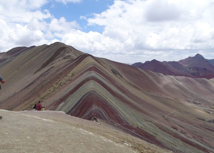 One person on lookout to Vinicunca or the Rainbow Mountain with no crowds and real colors | RESPONSible Travel Peru