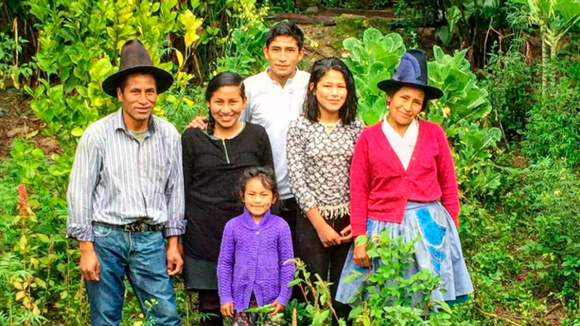 Pablos's family some years ago surrounded by their beautiful orchard | RESPONSible Travel Peru