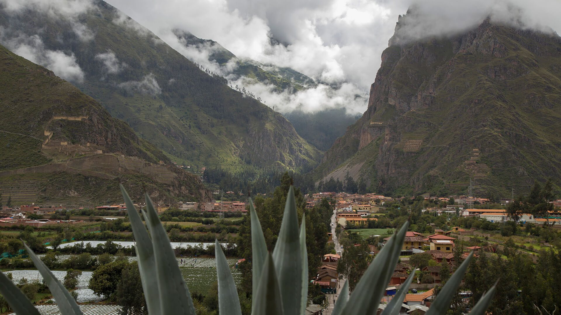 A cloudy day in Ollantaytambo with town and ruins at sight | RESPONSible Travel Peru