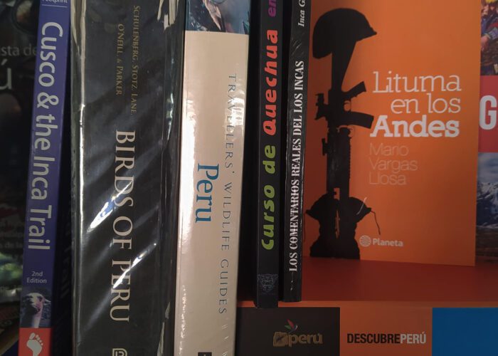Book shelf full of Peru related titles | RESPONSible Travel Peru