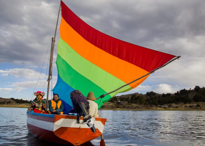 Rainbow sailboat on lake titicaca