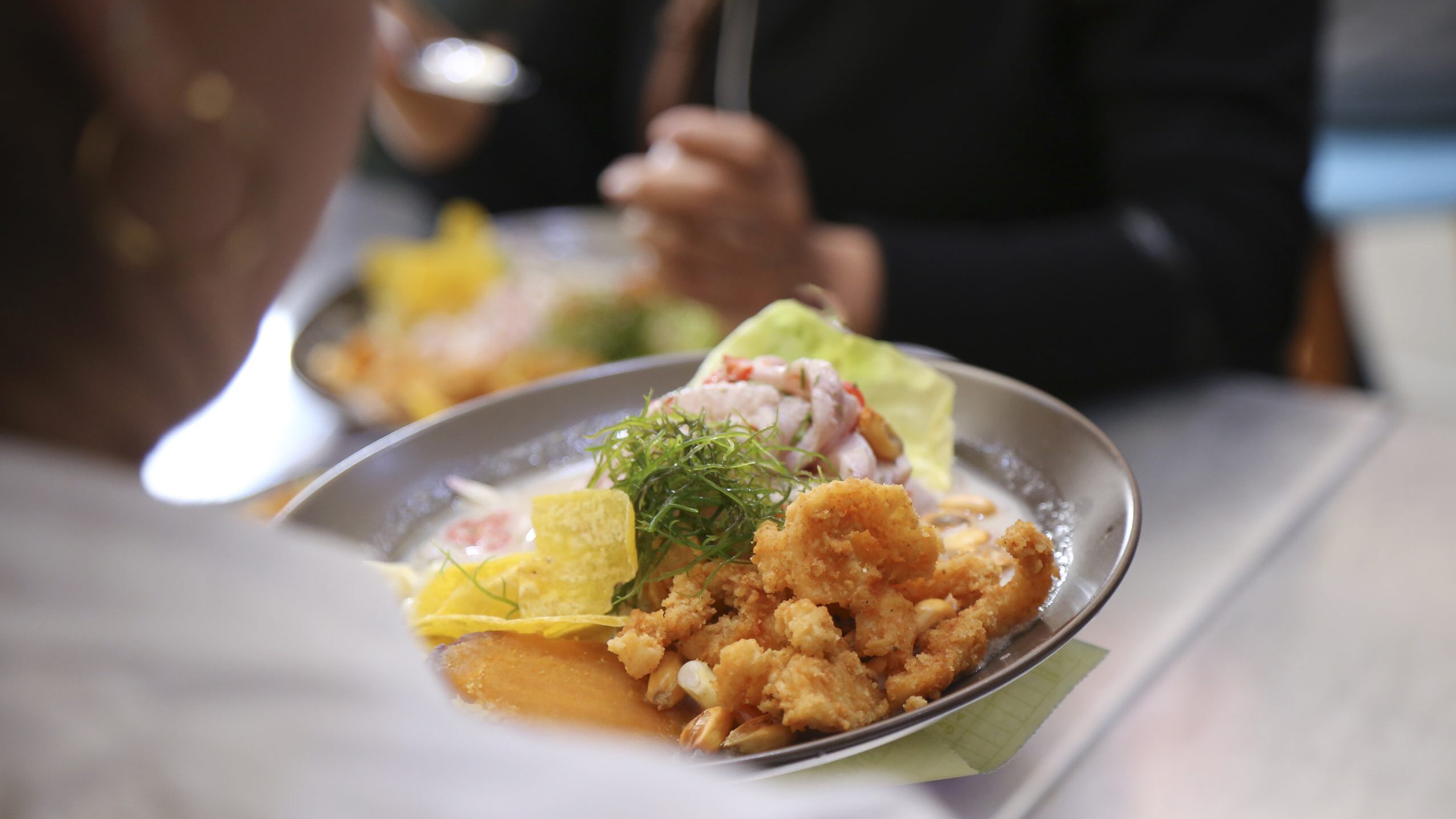 Combination of ceviche with chicharron of fish and seafood