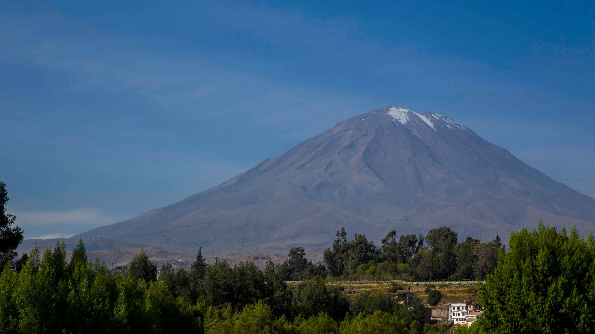 The Misti Volcano is a giant barren and snow topped mountain next to the city of Arequipa - RESPONSible Travel Peru
