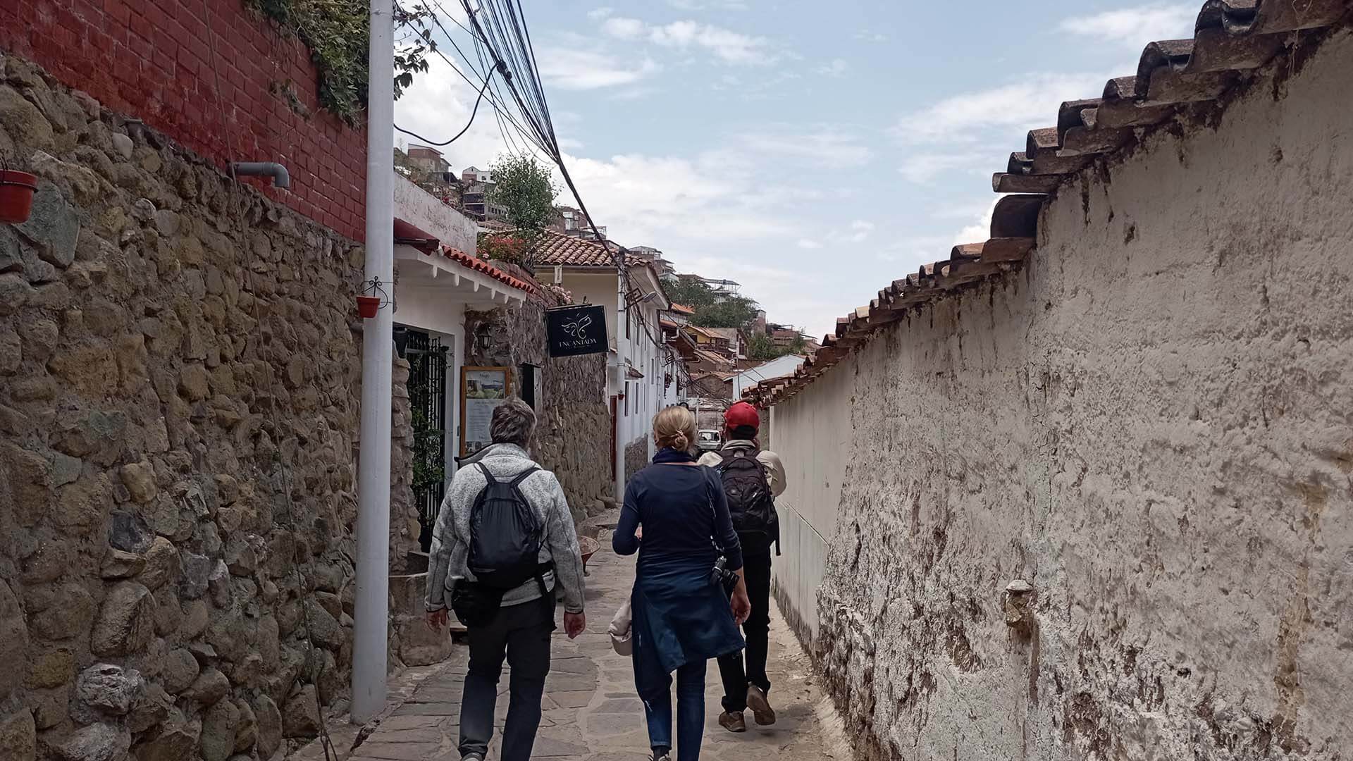 Tourists walking in Cusco center area - RESPONSible Travel Peru